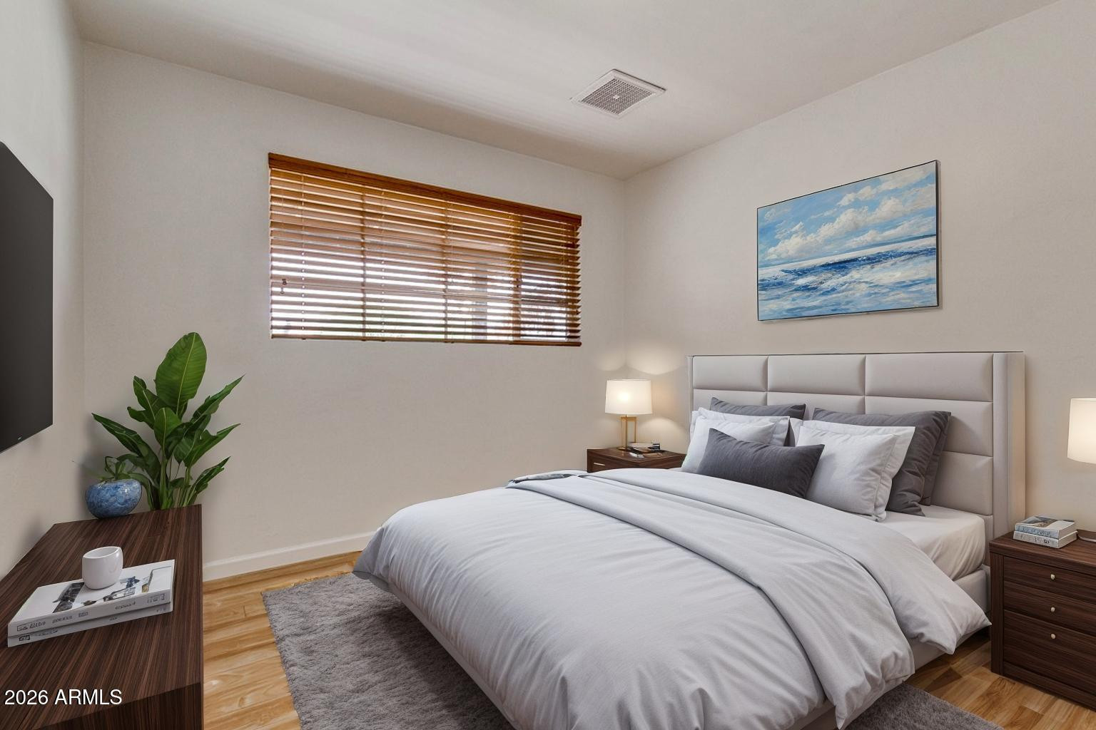 1308 West 6th Street Tempe, AZ 85281 - Photo 10 of 27 a bedroom with bed and a potted plant