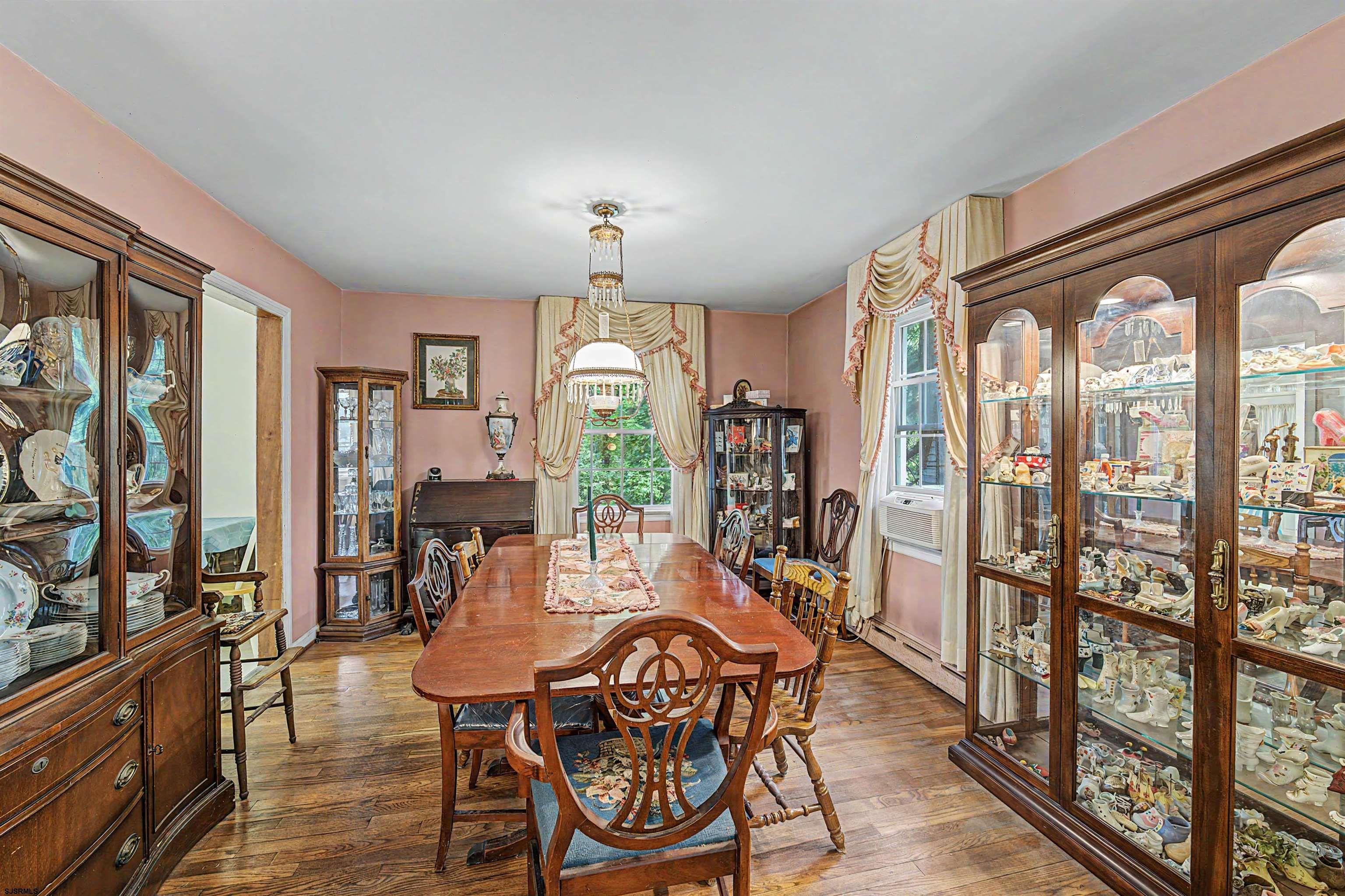 144 Pitney Road Absecon, NJ 08201 - Photo 16 of 47 a view of a dining room with furniture window and wooden floor