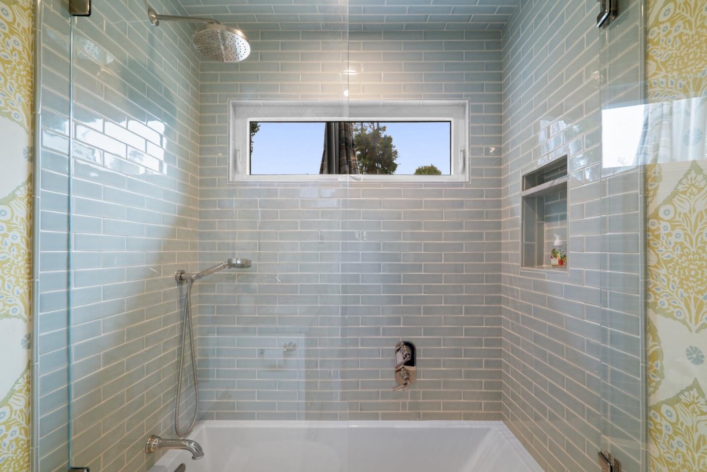 227 Highland Drive Aptos, CA 95003 - Photo 24 of 51 a bathroom with a bathtub and a shower