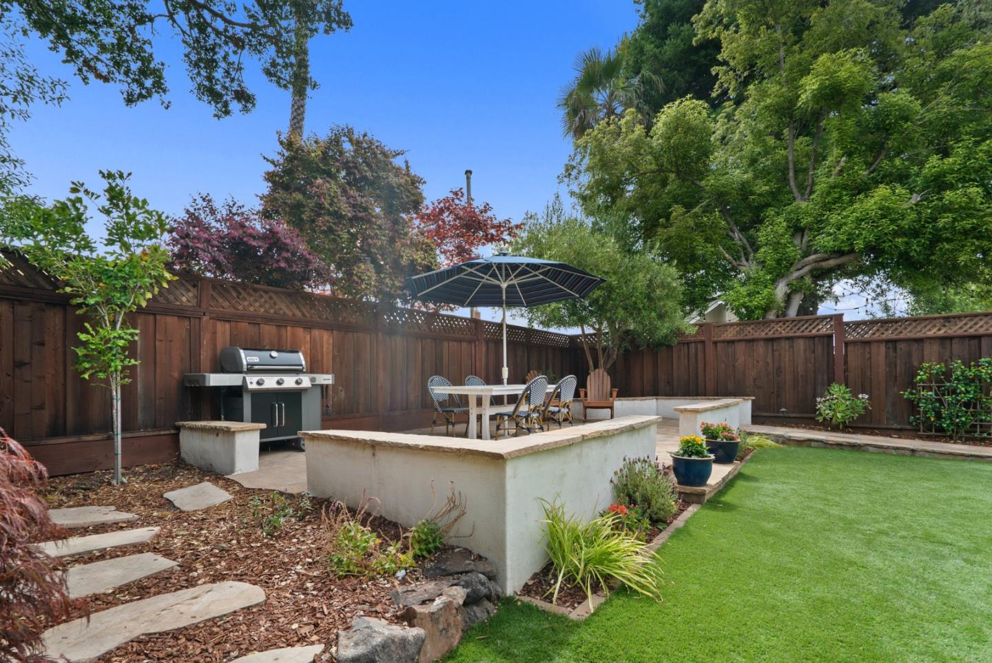227 Highland Drive Aptos, CA 95003 - Photo 40 of 51 a view of a backyard with sitting area and garden