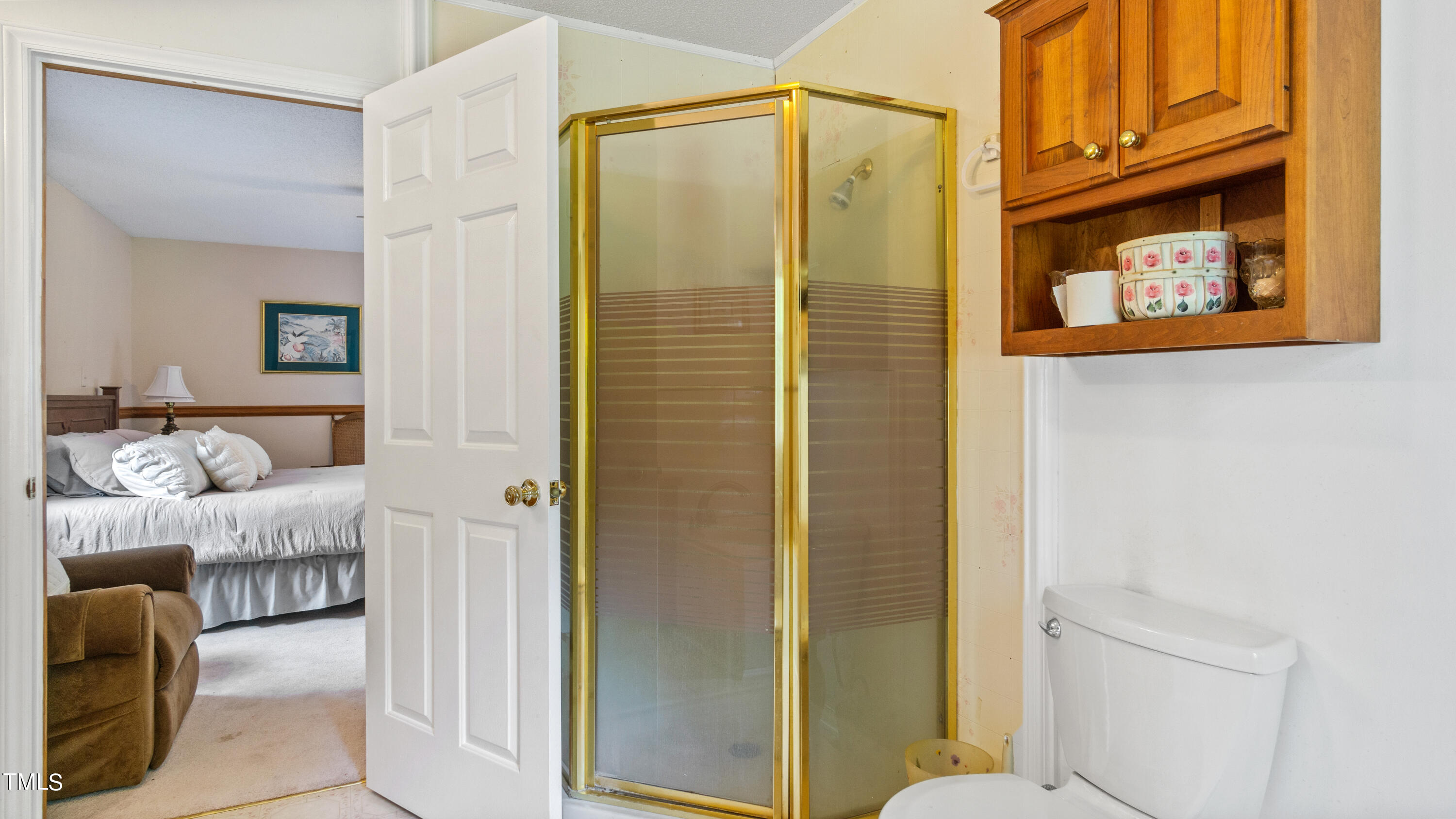 125 Walter Street Manson, NC 27553 - Photo 15 of 39 a bathroom with a shower and a sink
