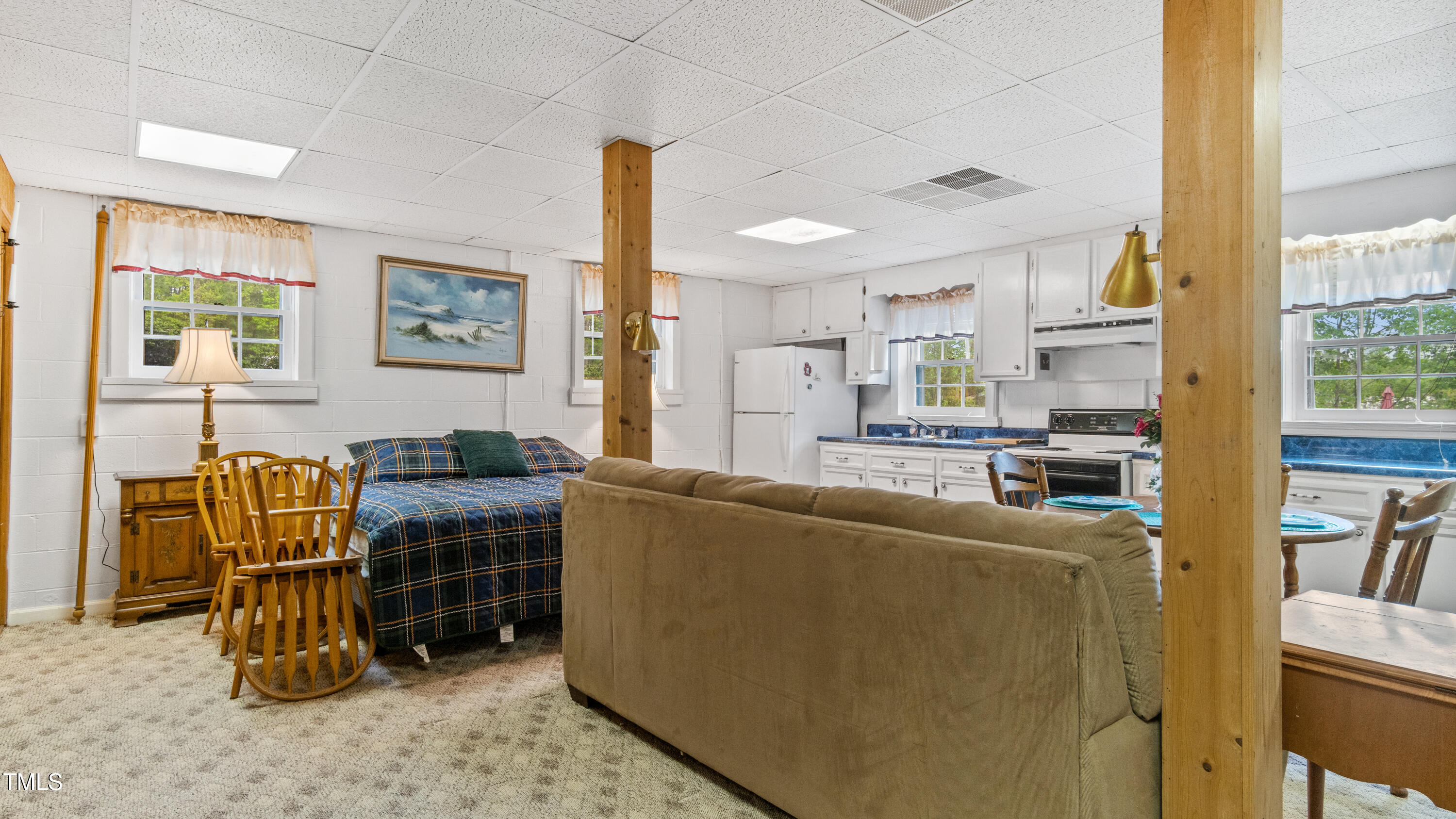 125 Walter Street Manson, NC 27553 - Photo 27 of 39 a living room with furniture and a window