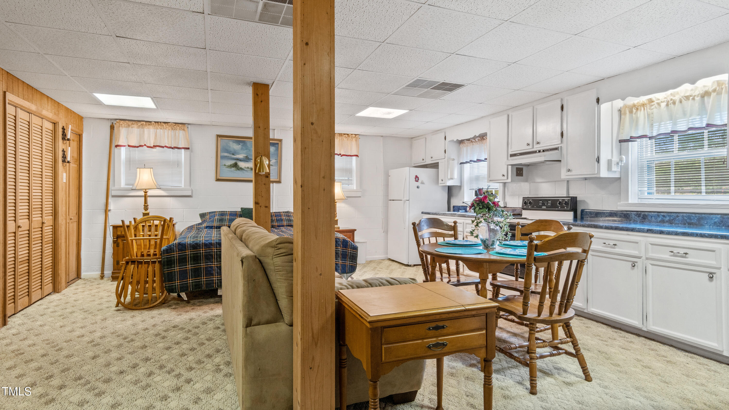 125 Walter Street Manson, NC 27553 - Photo 28 of 39 a dining room with furniture and large windows