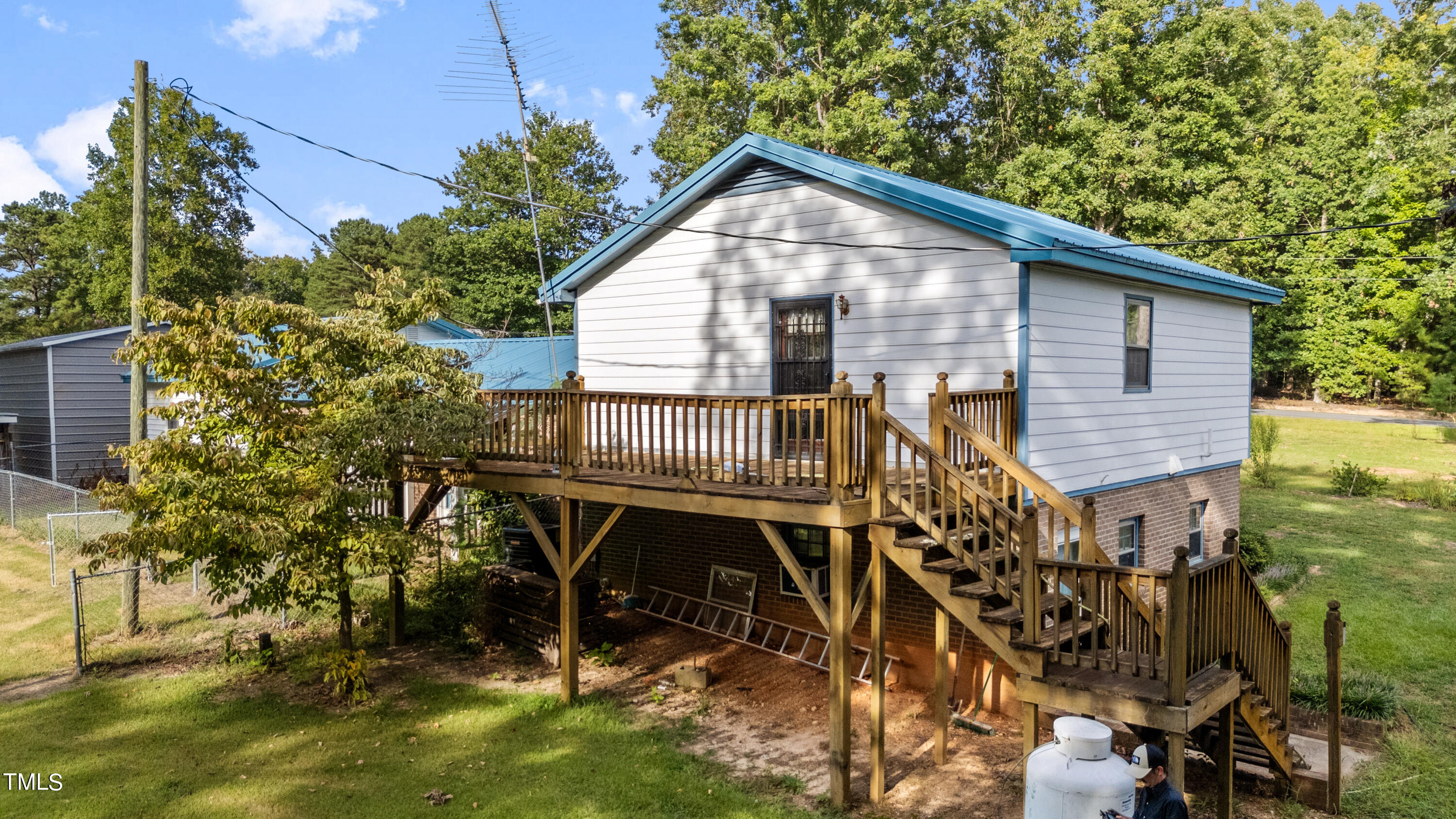 125 Walter Street Manson, NC 27553 - Photo 29 of 39 a view of a house with pool and chairs