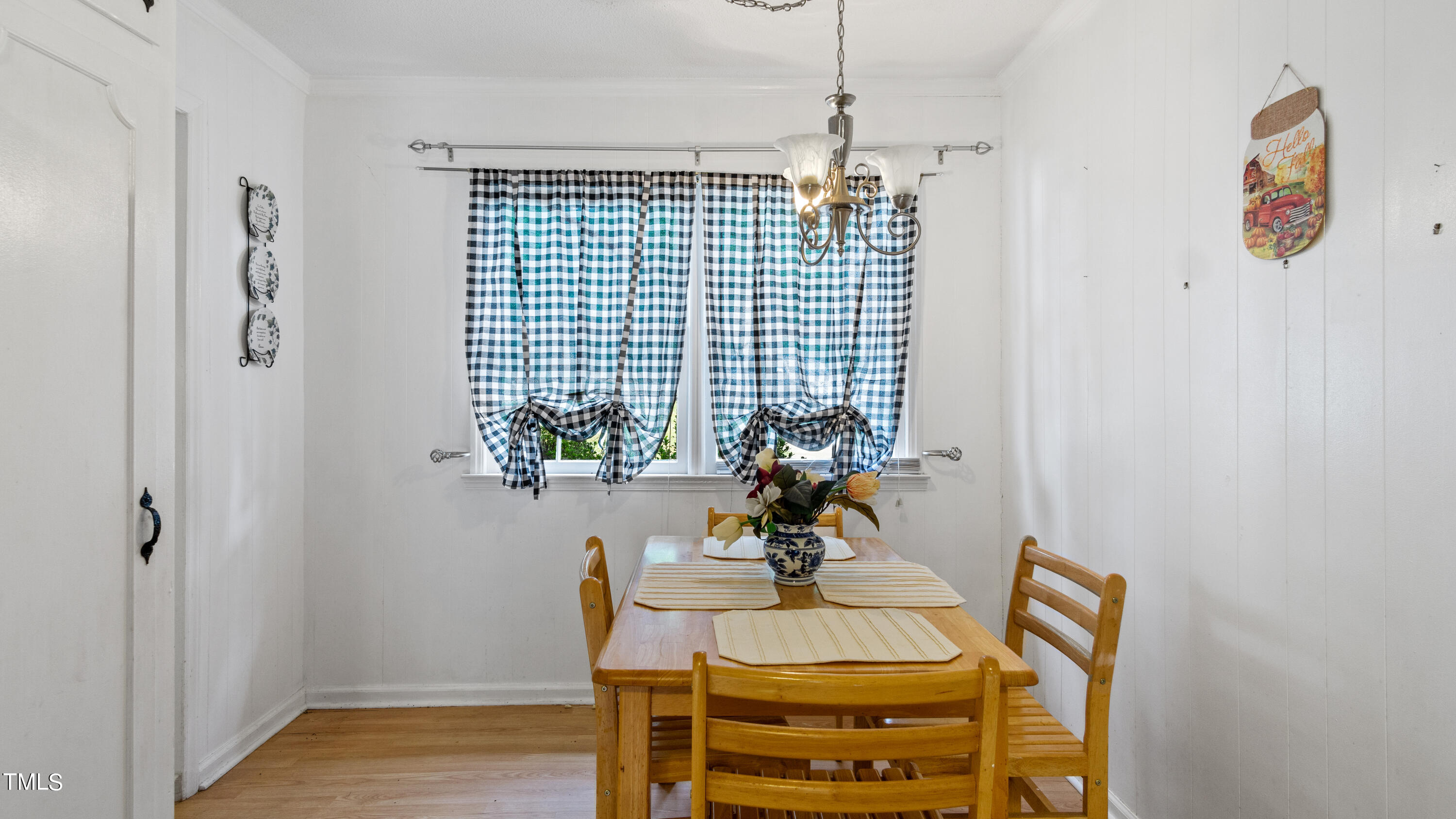 125 Walter Street Manson, NC 27553 - Photo 10 of 39 a view of a workspace with furniture and a window
