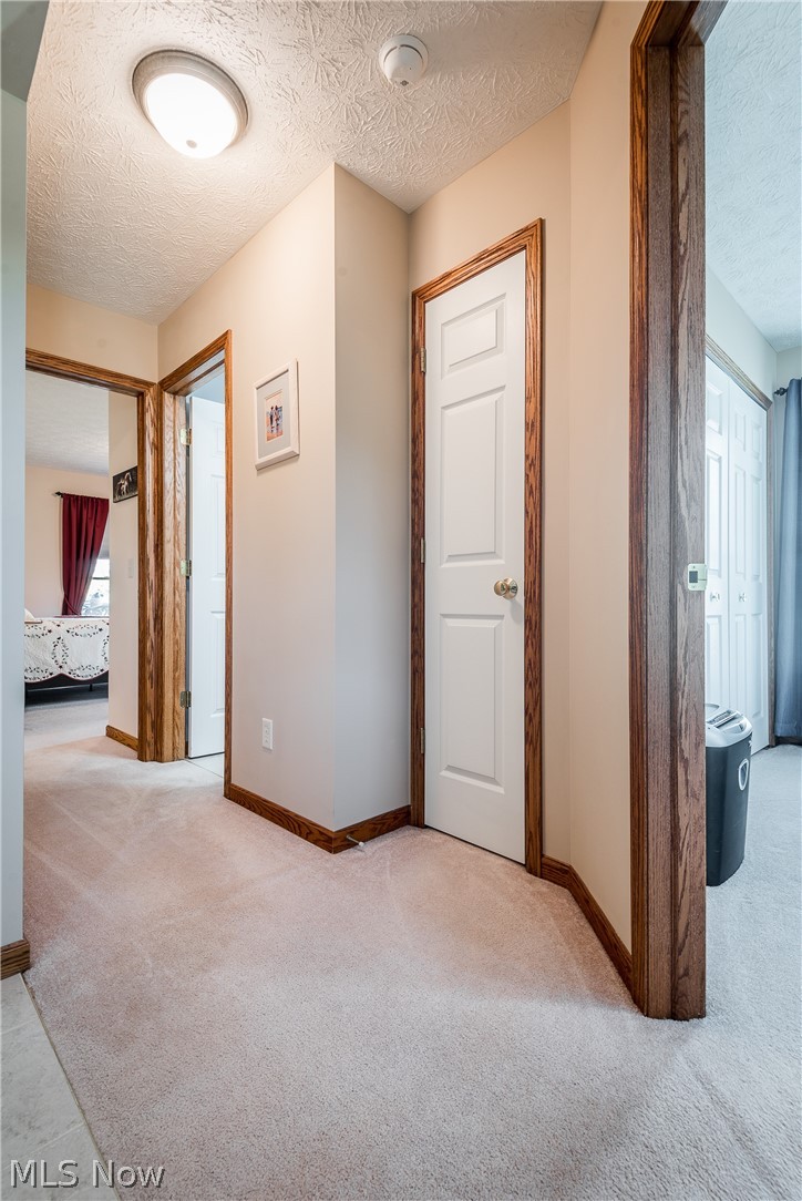 1947 Summerchase Road Northeast Canton, OH 44721 - Photo 25 of 33 Hallway for bedrooms 2 and 3 and bathroom