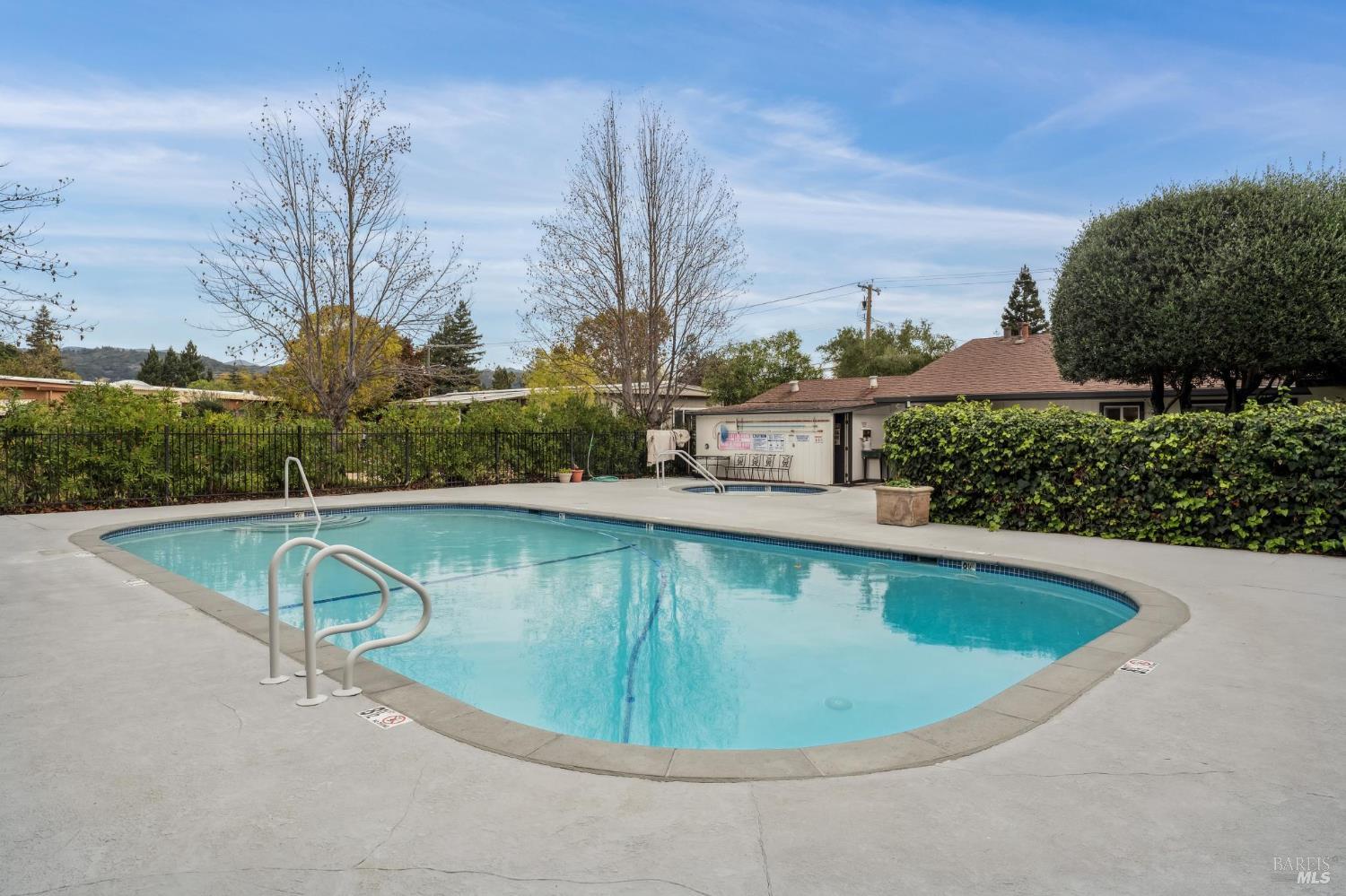 109 Merida Drive Sonoma, CA 95476 - Photo 14 of 20 a view of a swimming pool with a yard and plants