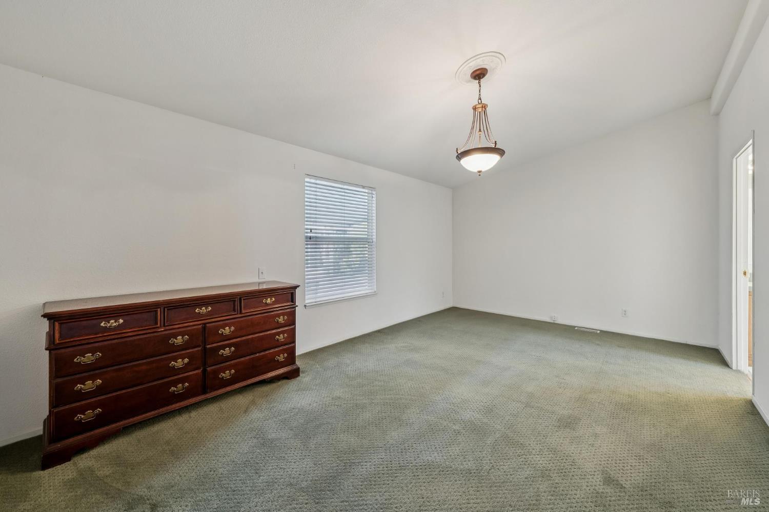 109 Merida Drive Sonoma, CA 95476 - Photo 8 of 20 a view of room with lounge chair and windows