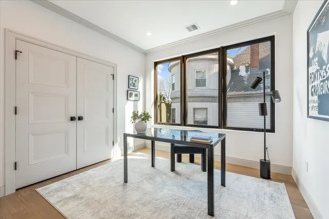 a view of a livingroom with furniture and window