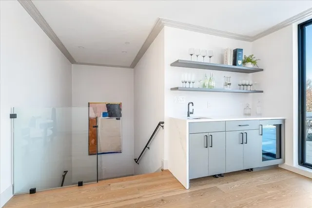 a bedroom with a bed and cabinets
