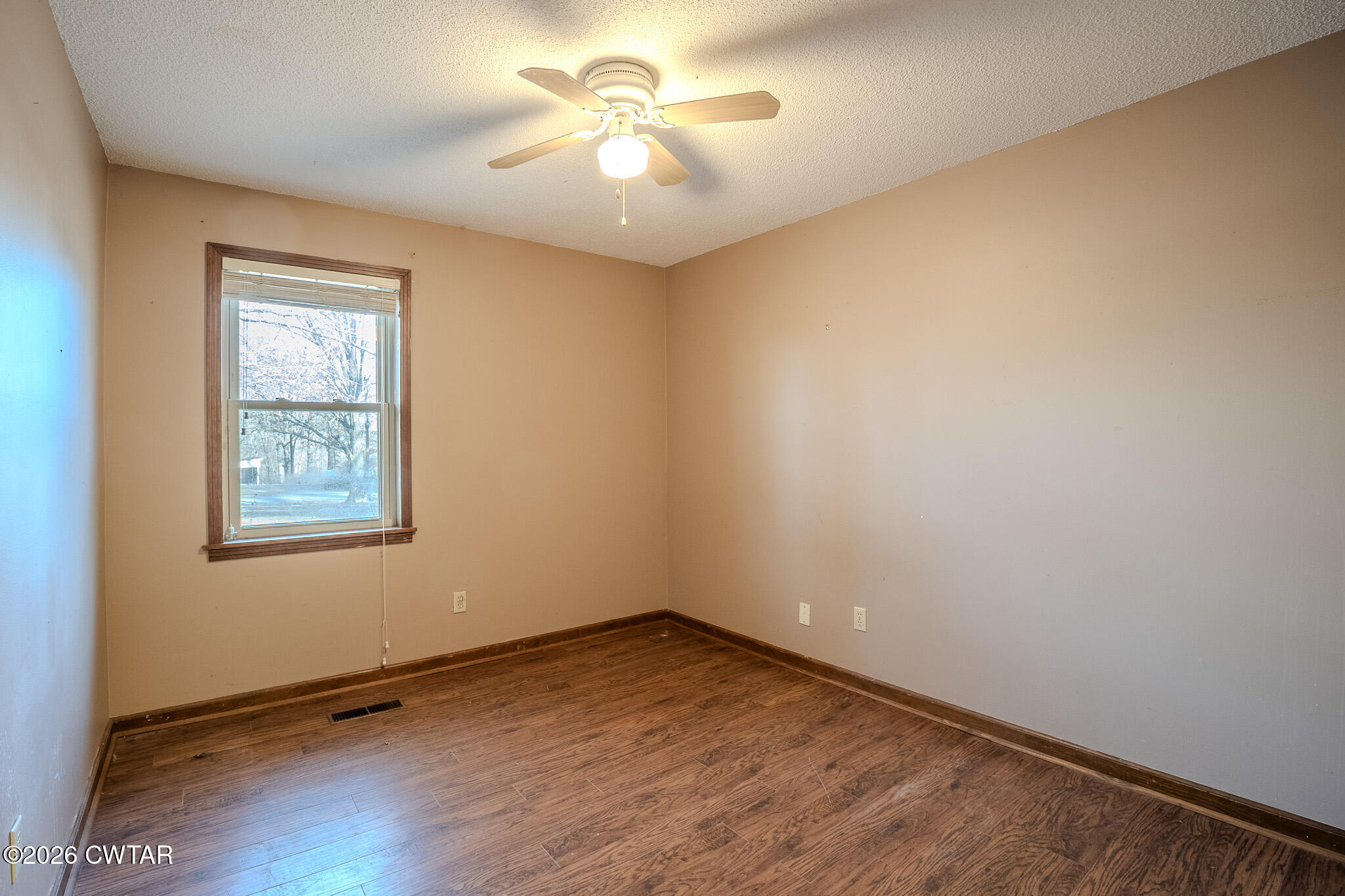 3559 Union Mercer Road Brownsville, TN 38012 - Photo 13 of 24 an empty room with a window
