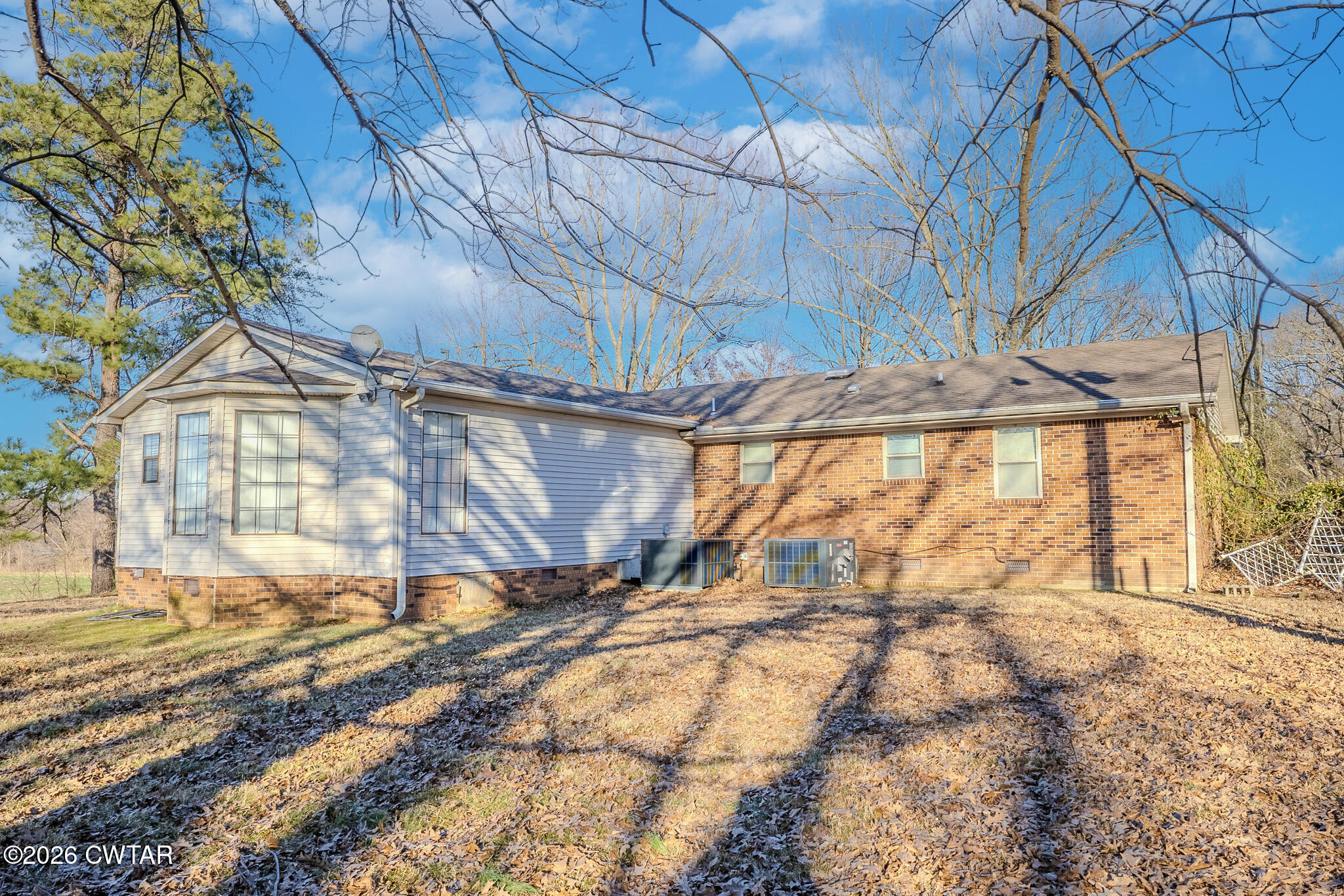 3559 Union Mercer Road Brownsville, TN 38012 - Photo 2 of 24 a view of a backyard of a house