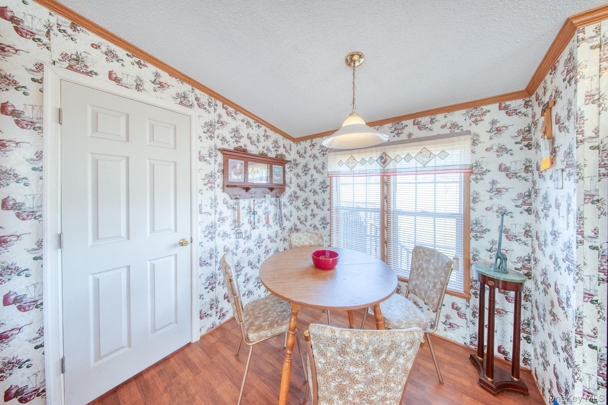 221 Gabel Road Callicoon, NY 12723 - Photo 13 of 44 a view of a dining room with furniture and wooden floor