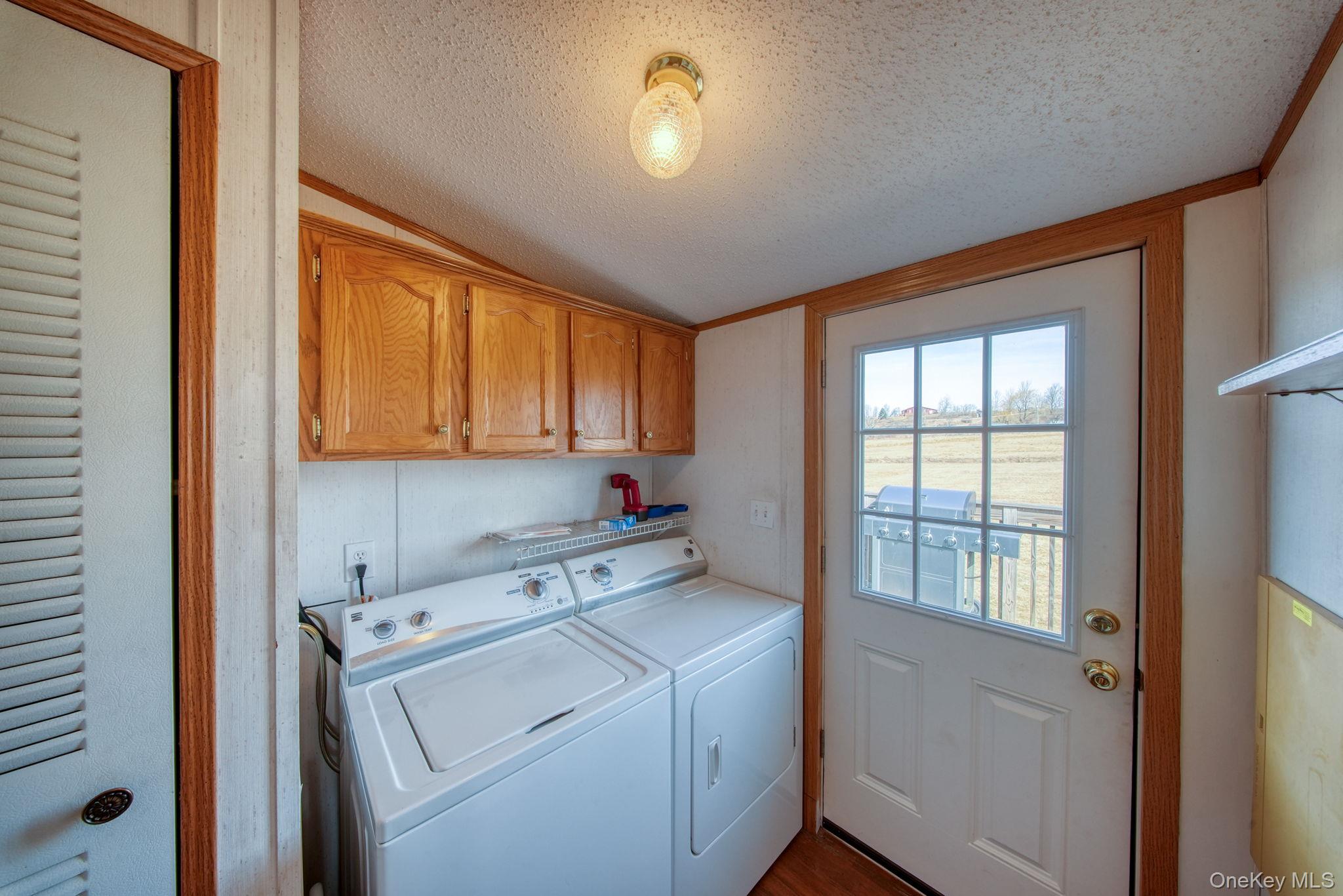 221 Gabel Road Callicoon, NY 12723 - Photo 18 of 44 a view of storage and utility room with a window