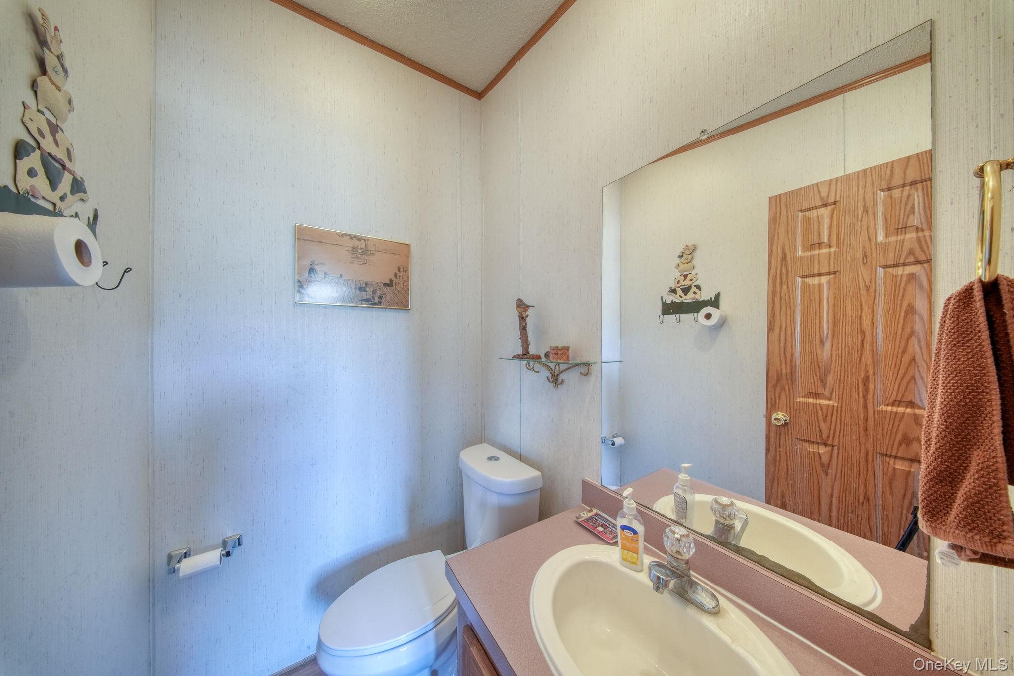 221 Gabel Road Callicoon, NY 12723 - Photo 19 of 44 a bathroom with a sink toilet and shower
