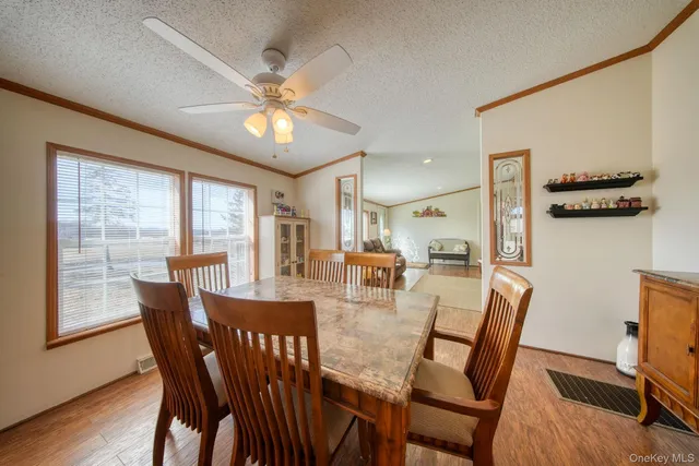a living room with furniture and a gate