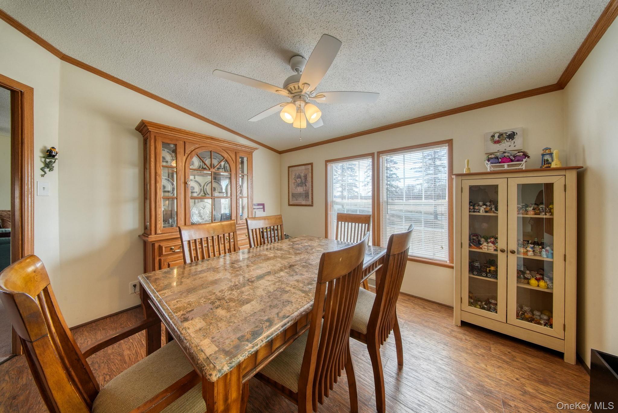 221 Gabel Road Callicoon, NY 12723 - Photo 21 of 44 a view of a dining room with furniture window and wooden floor