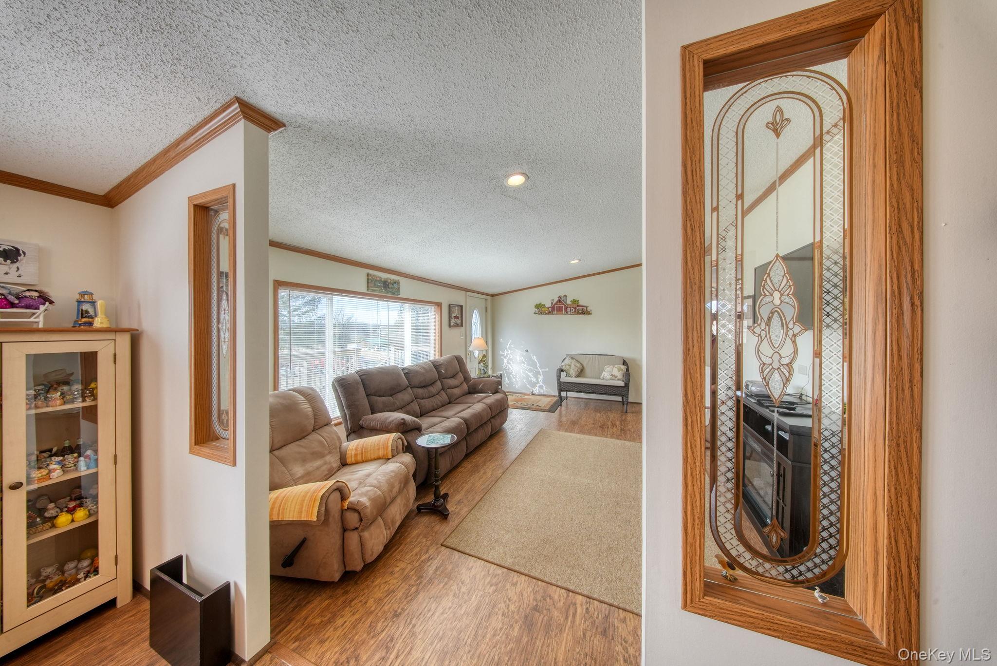 221 Gabel Road Callicoon, NY 12723 - Photo 22 of 44 a living room with furniture and a gate