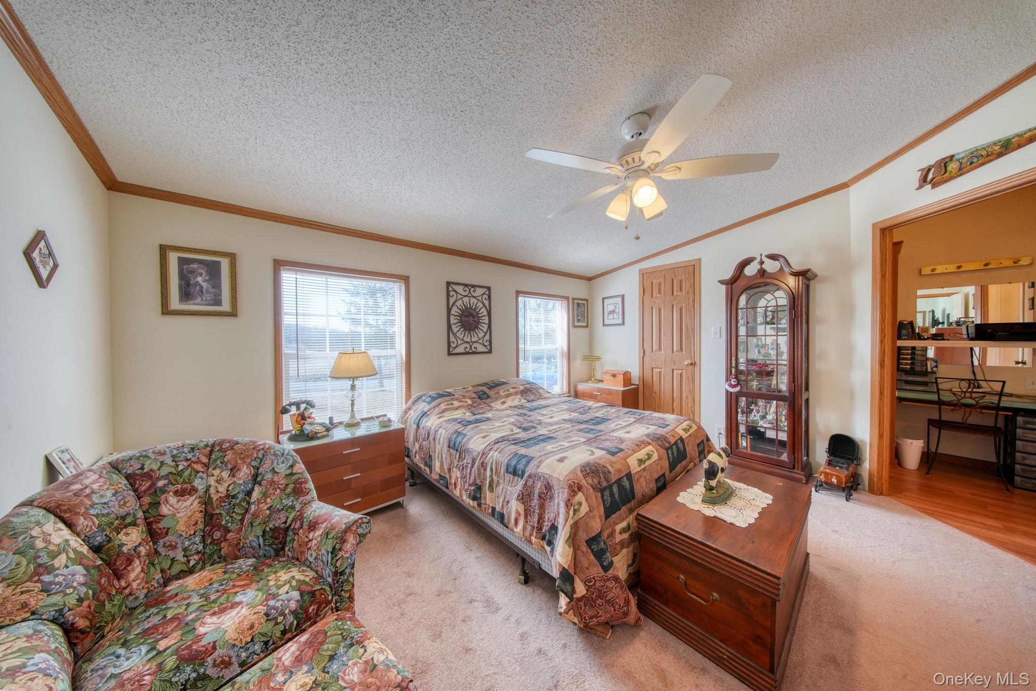 221 Gabel Road Callicoon, NY 12723 - Photo 31 of 44 a bedroom with a bed couch and window