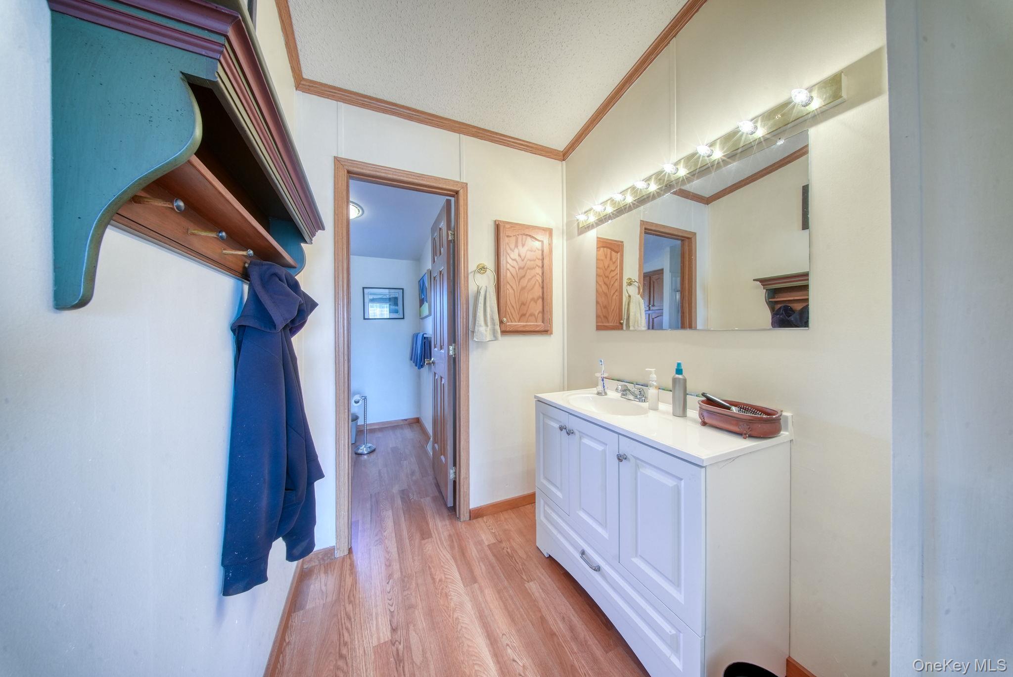 221 Gabel Road Callicoon, NY 12723 - Photo 35 of 44 a bathroom with a sink a mirror and a shower