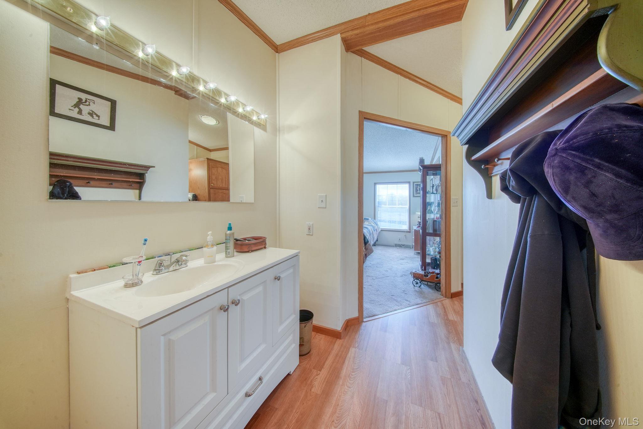 221 Gabel Road Callicoon, NY 12723 - Photo 37 of 44 a bathroom with a sink a mirror and a shower