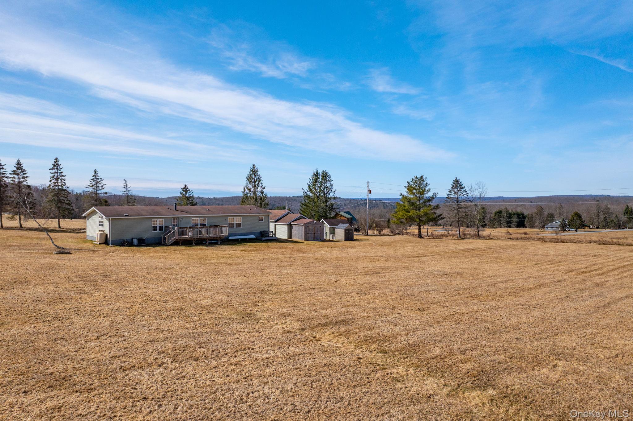 221 Gabel Road Callicoon, NY 12723 - Photo 40 of 44 a group of people sitting on top of a lake