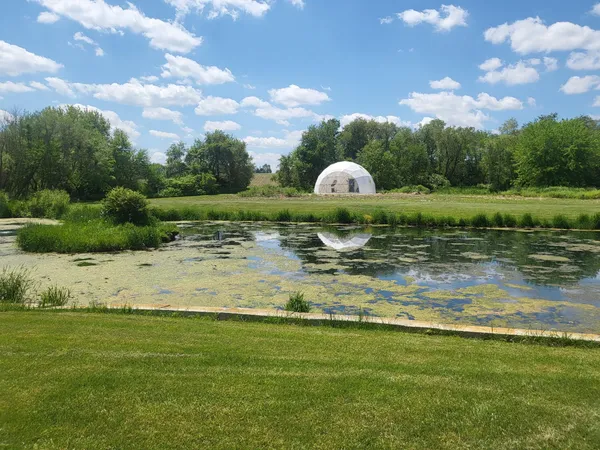 a view of a lake with a big yard