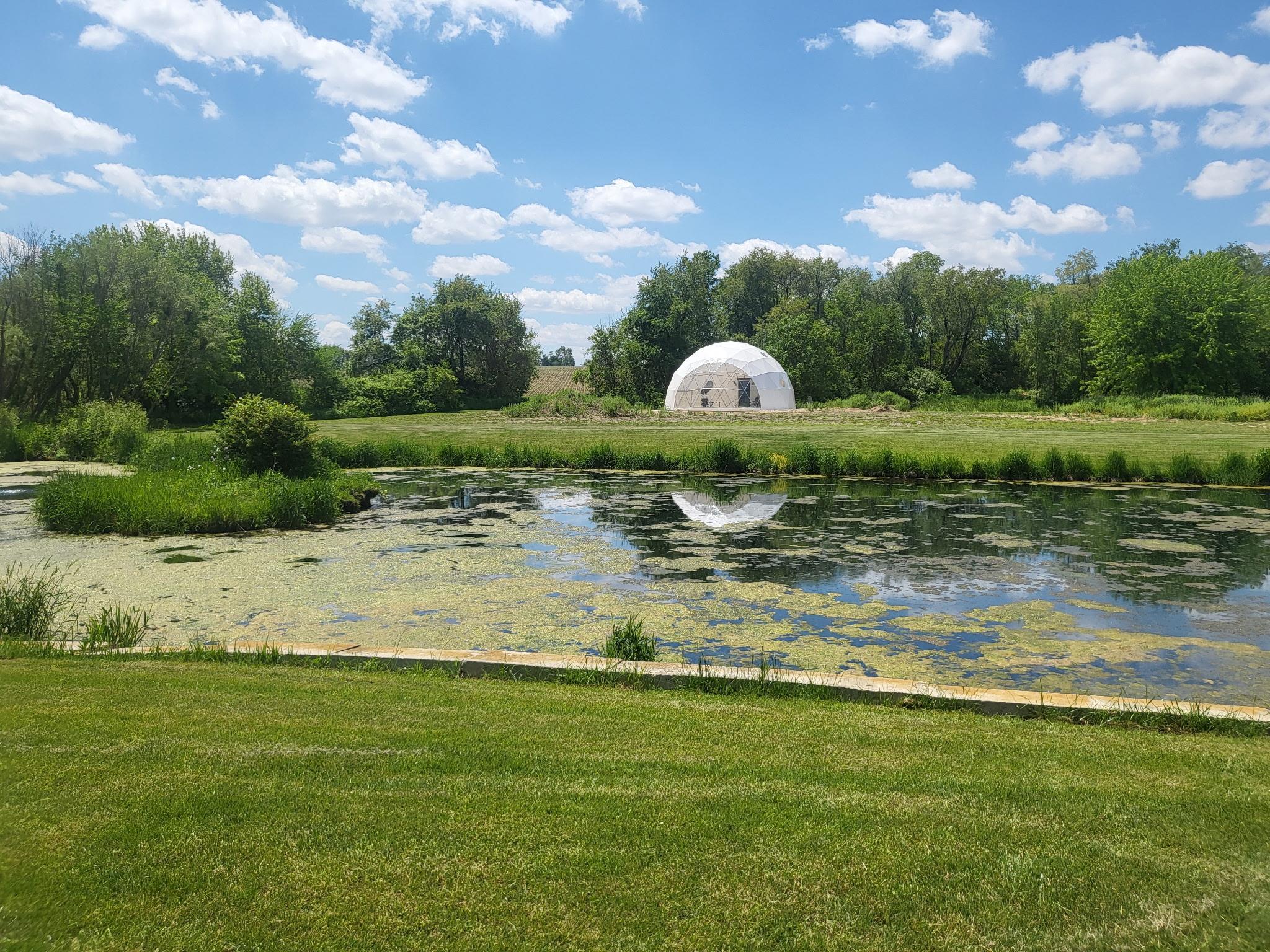4414 North Tower Road Freeport, IL 61032 - Photo 4 of 8 a view of a lake from a yard