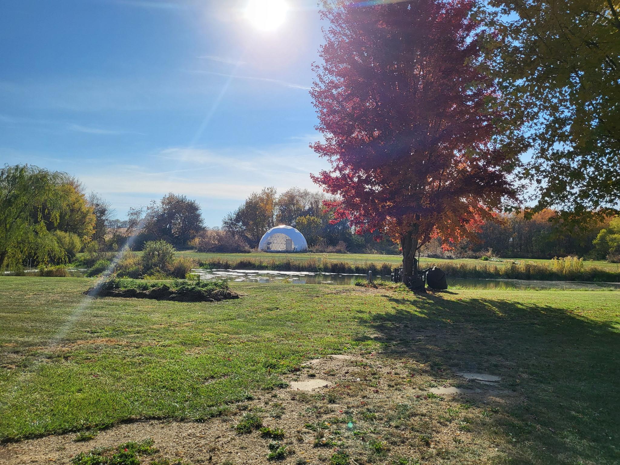 4414 North Tower Road Freeport, IL 61032 - Photo 5 of 8 a view of a lake with a big yard