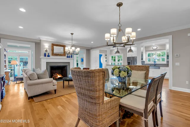 a view of a livingroom with furniture window and wooden floor