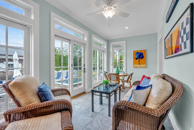 a spacious bedroom with a bed and a fireplace