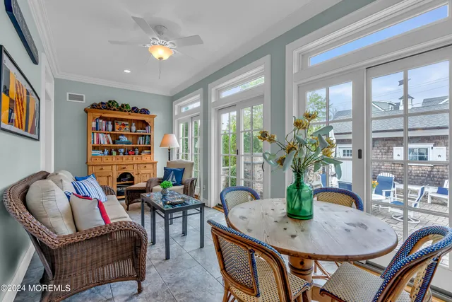 a bedroom with a large bed and a table