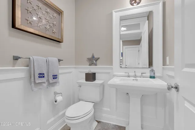 a bathroom with a shower and toilet
