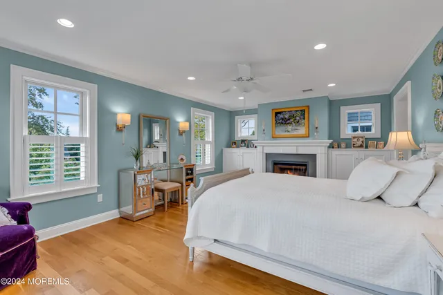 a bed room with a bed and a chair