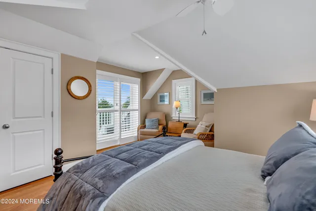 a front view of a house with a ocean view