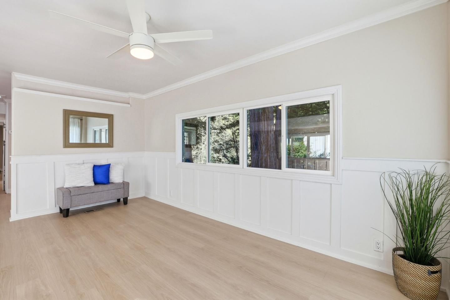 265 Brown Gables Road, Unit 11 Ben Lomond, CA 95005 - Photo 5 of 50 a living room with furniture and a potted plant
