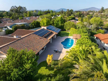 view of a lake with a garden