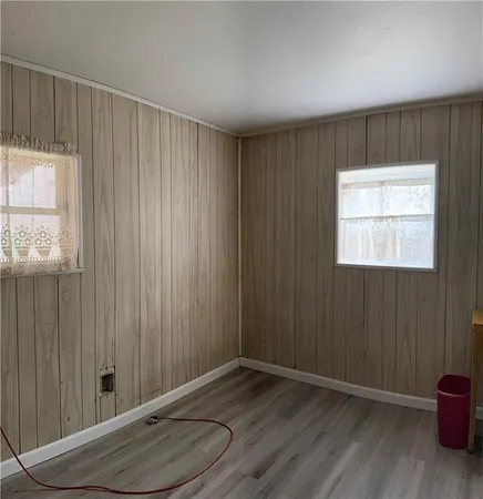 a bathroom with a shower and a toilet