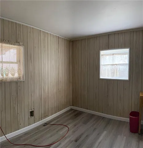 a bathroom with a shower and a toilet