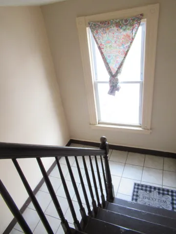 a front view of a house with a garage