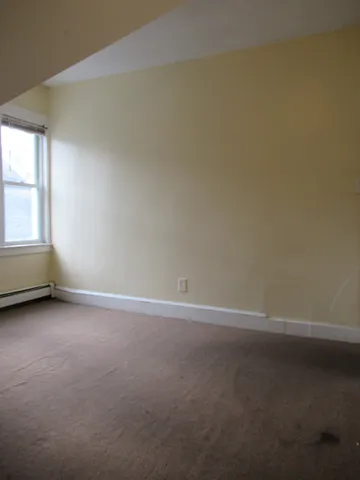 an empty room with a window