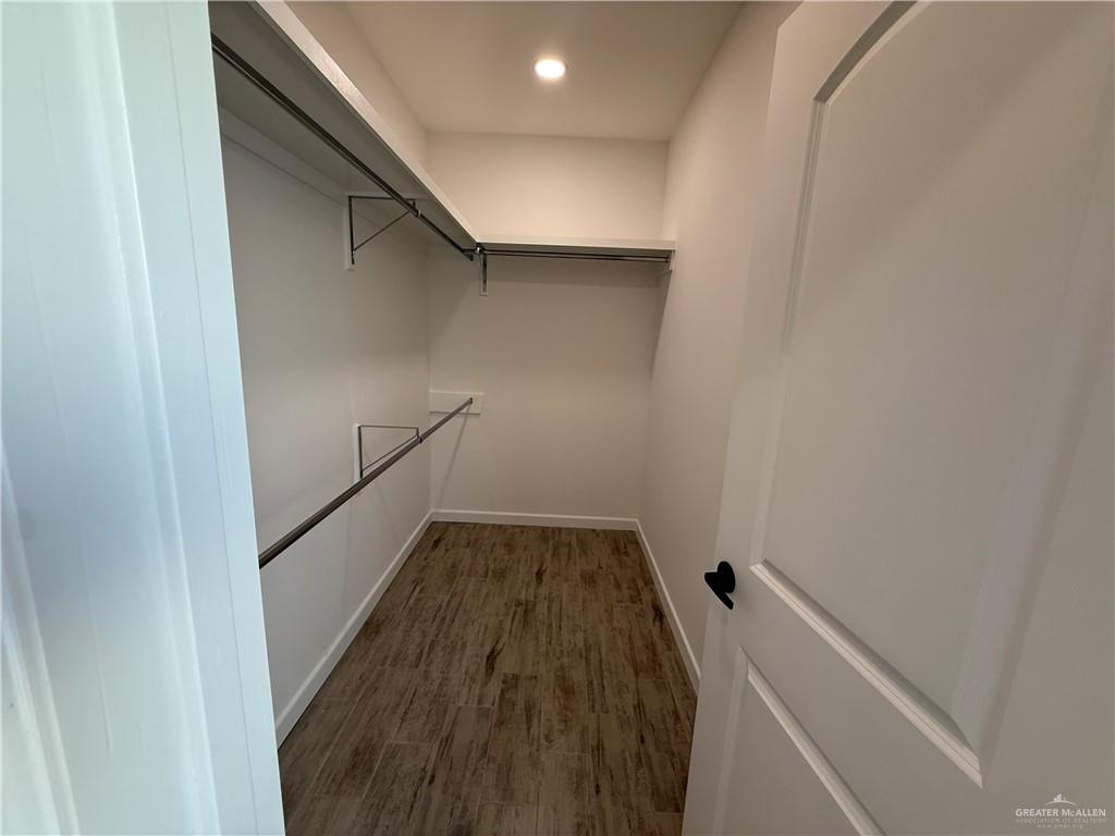 2701 Brownjay Road, Unit #3 Weslaco, TX 78596 - Photo 10 of 18 a view of wooden floor in an empty room