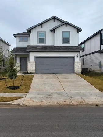 a house view with a outdoor space