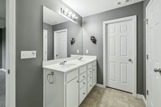 1470 Old Stone Road Lebanon, TN 37087 - Photo 12 of 23 a bathroom with a double vanity sink mirror and