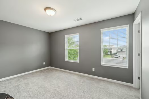 1470 Old Stone Road Lebanon, TN 37087 - Photo 17 of 23 an empty room with windows