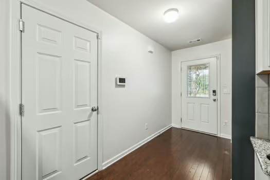 1470 Old Stone Road Lebanon, TN 37087 - Photo 4 of 23 an empty room with wooden floor closet and windows