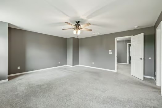 1470 Old Stone Road Lebanon, TN 37087 - Photo 10 of 23 a view of an empty room with a ceiling fan