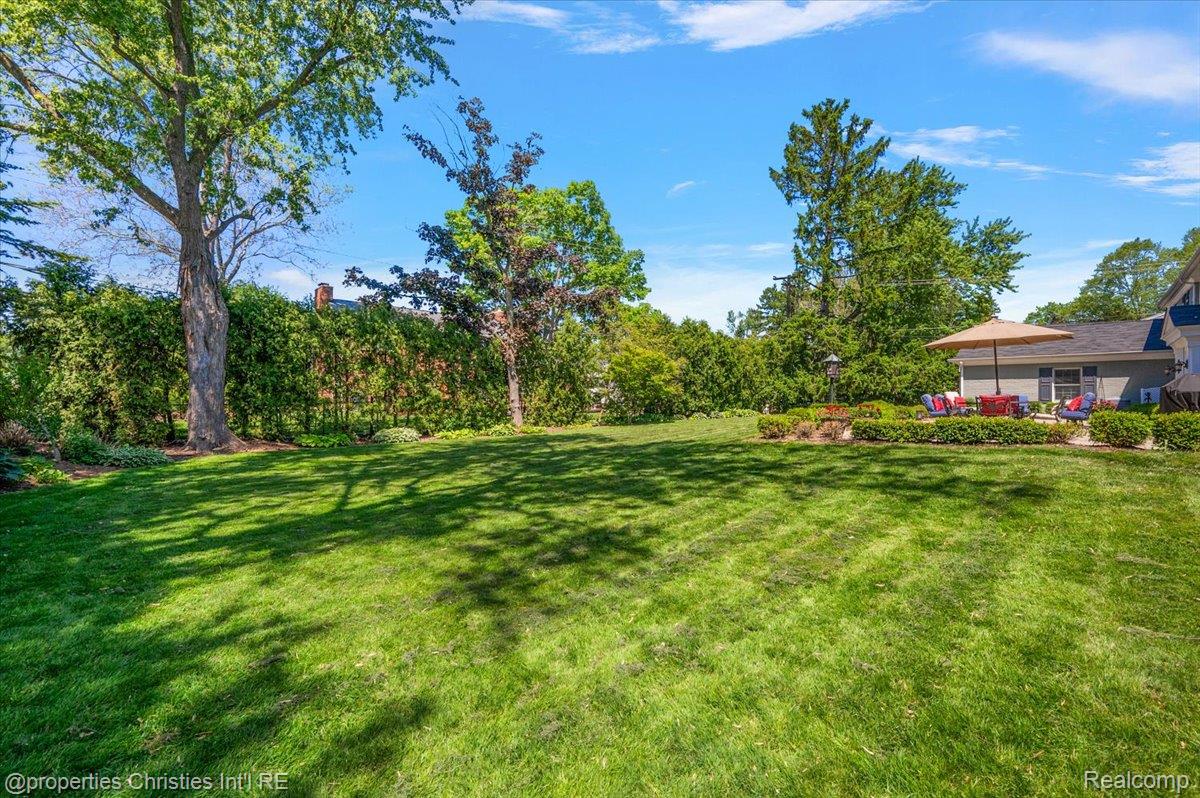 135 Clifton Road Bloomfield Hills, MI 48301 - Photo 74 of 77 Expansive lawn surrounded by mature trees and privacy hedging