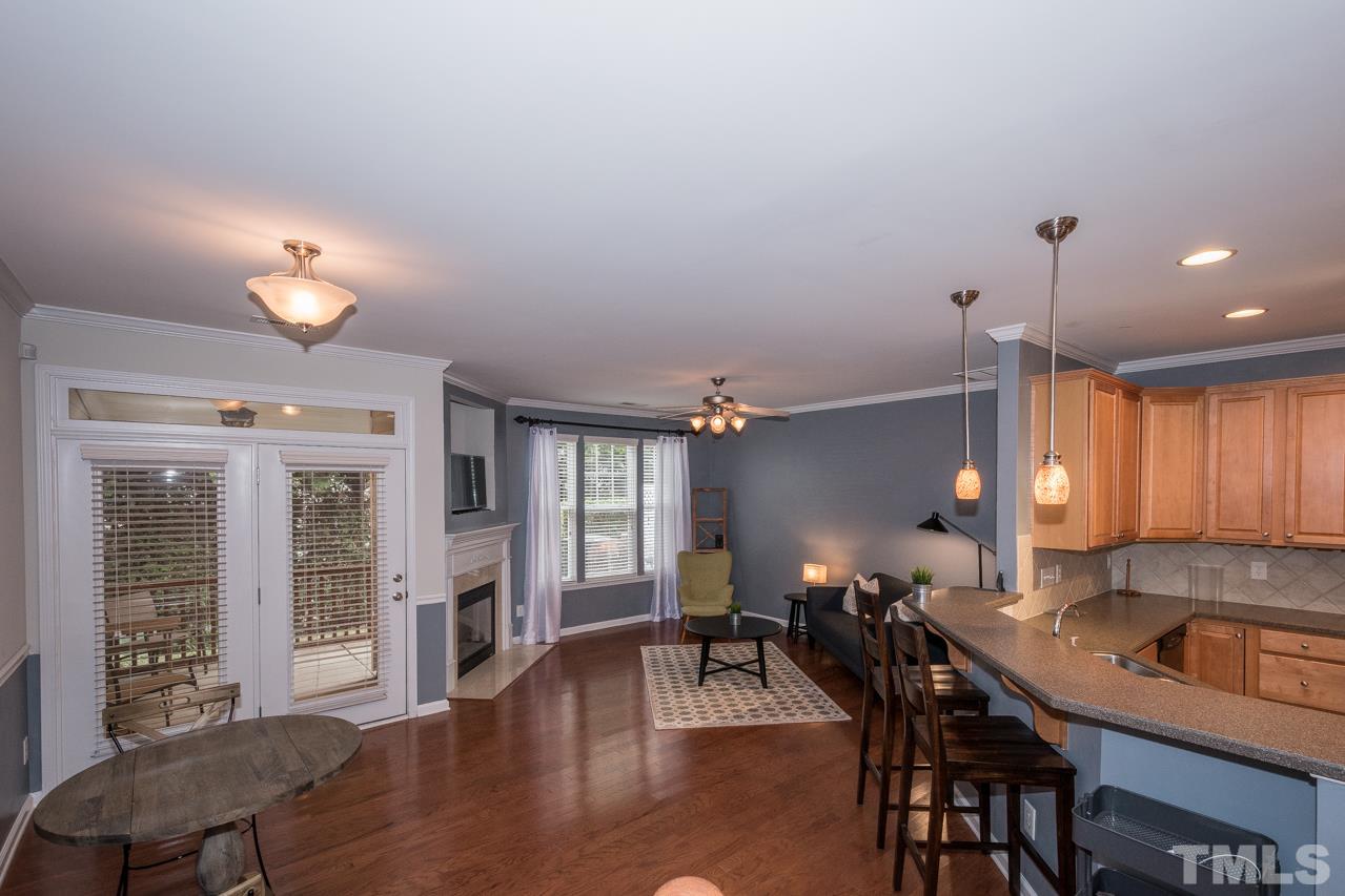 4924 Amber Clay Lane Raleigh, NC 27612 - Photo 13 of 24 a view of a kitchen and dining room