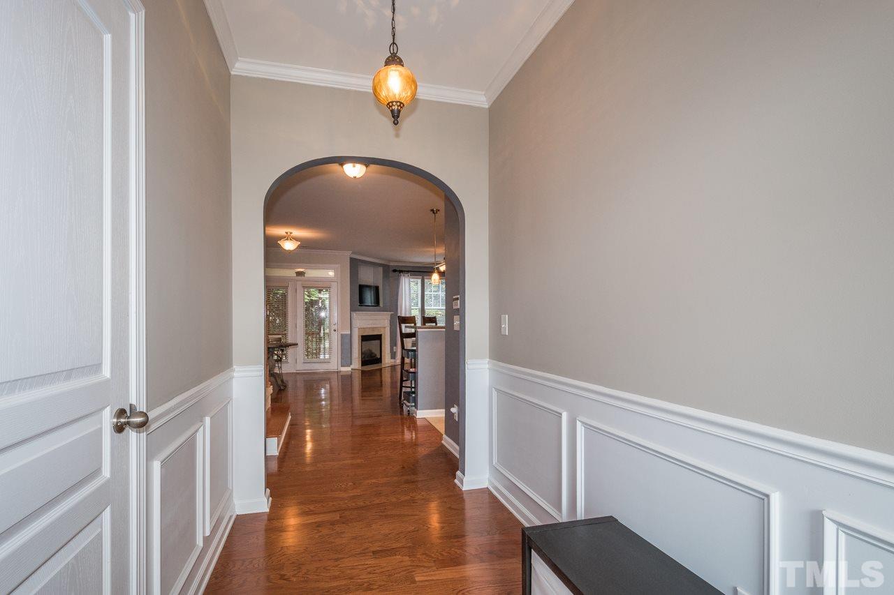 4924 Amber Clay Lane Raleigh, NC 27612 - Photo 4 of 24 a view of livingroom with furniture and wooden floor